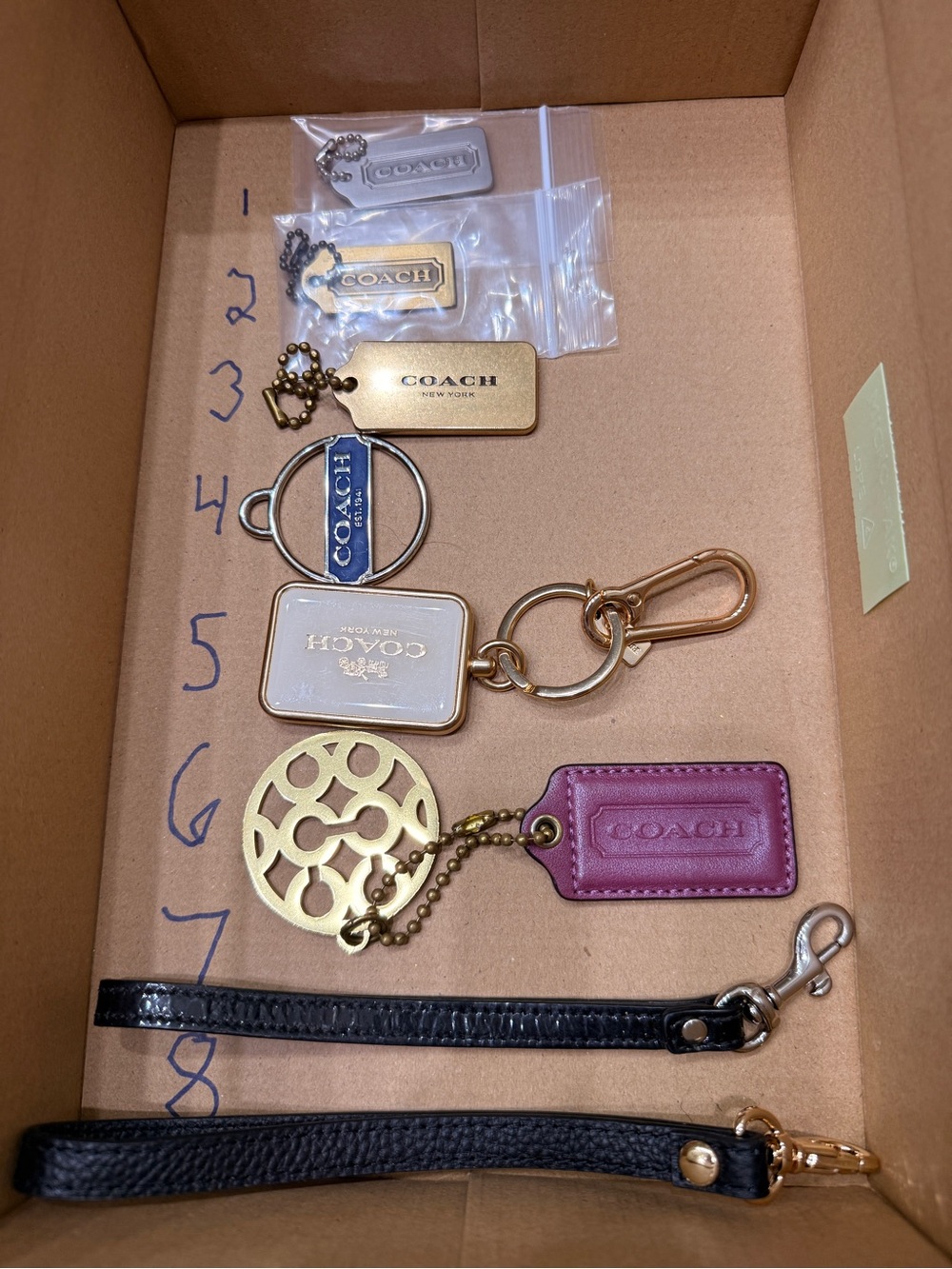 Coach Mixed Leather Hang Tags and Metal Tags and Wrist Straps sold separately